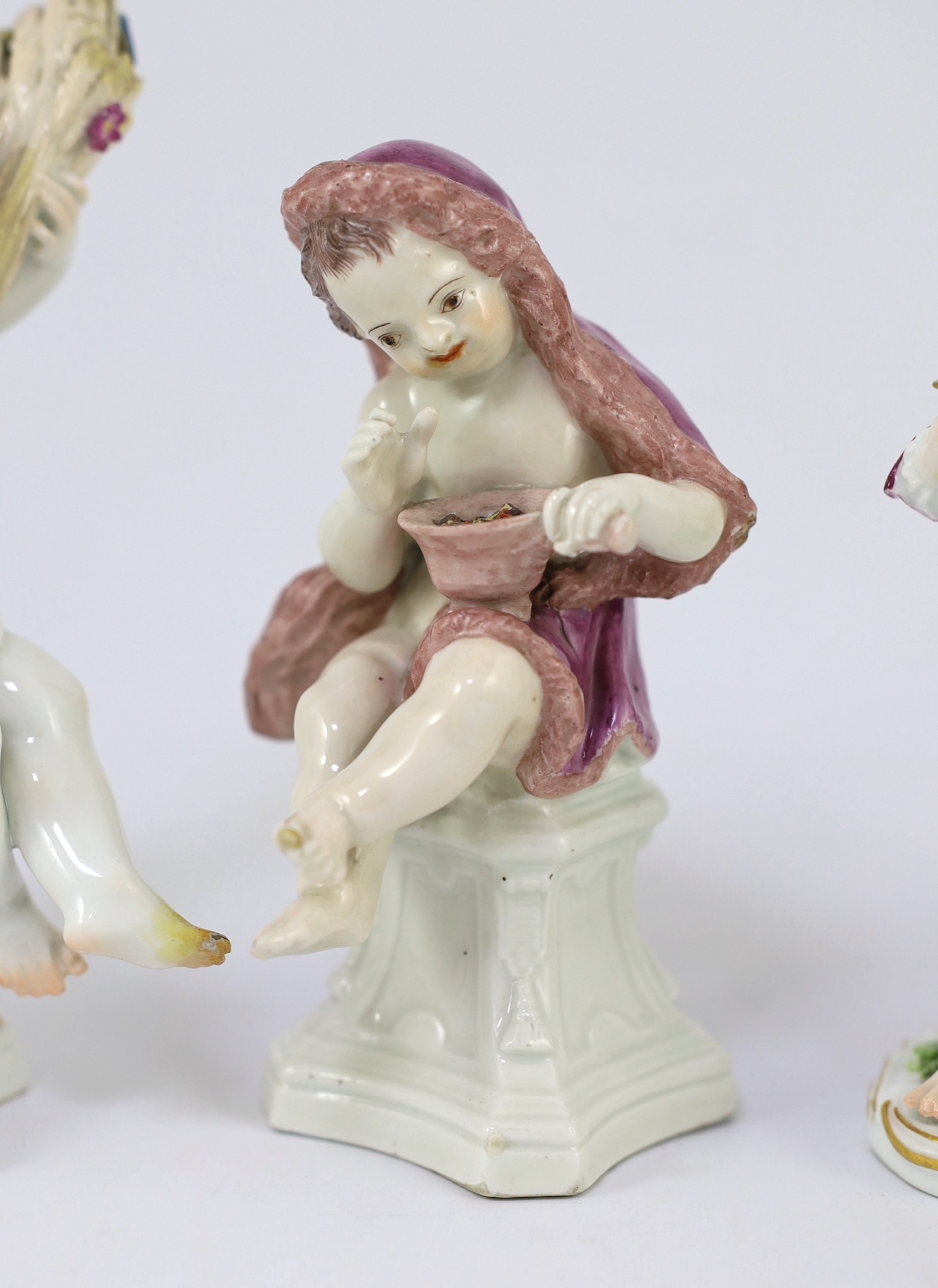 Six Meissen porcelain figures of putti and a boy, second half 18th century, 8.5cm - 14.5cm high, restorations